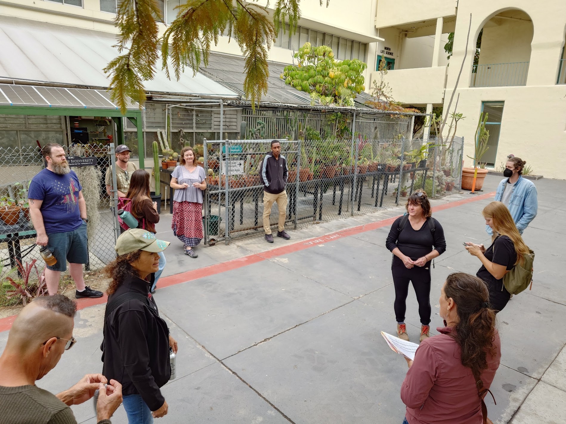 Student from Greenhouse Plant Production course taught at Cuyamaca College, visiting the SDSU Greenhouse.